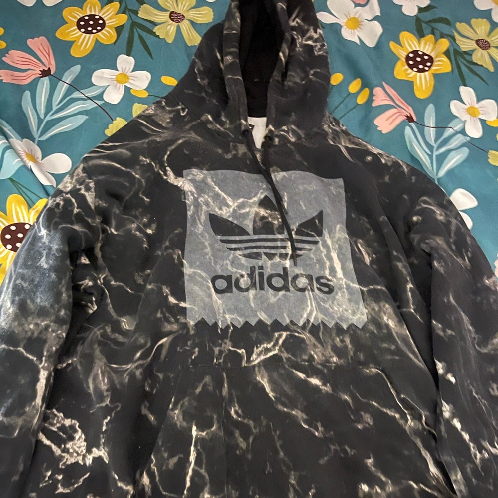 This is a 2XL black Adidas hoodie.